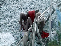 Horny couple spied on a beach