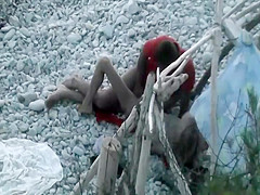 Horny couple spied on a beach