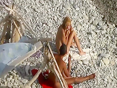 Horny couple spied on a beach