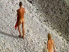 Horny couple spied on a beach