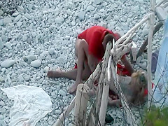 Horny couple spied on a beach