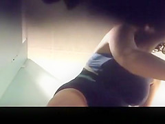 Mature woman caught in pool cabin