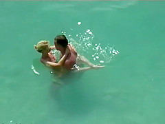 Couple kissing and fucking in the water