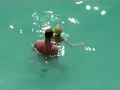 Couple kissing and fucking in the water