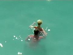 Couple kissing and fucking in the water