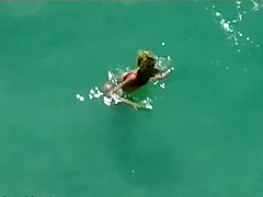 Couple kissing and fucking in the water