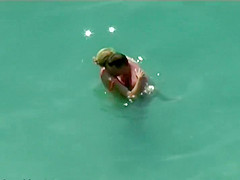 Couple kissing and fucking in the water