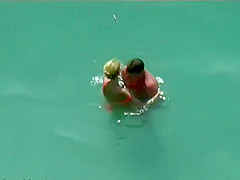 Couple kissing and fucking in the water