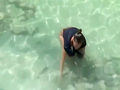 Naked woman is afraid of the sun