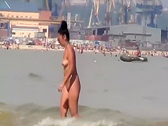 Peeping two seductive tanned girls