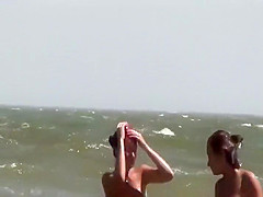 Peeping two seductive tanned girls