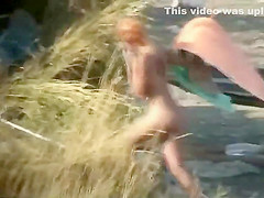 Spying a nude girl with an itchy ass