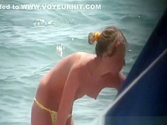 Tiny tits topless women at beach