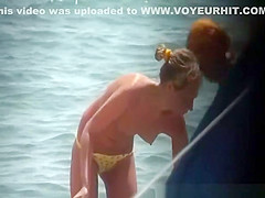 Tiny tits topless women at beach