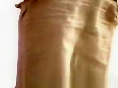 Girl in green bikini at beach