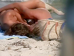 Couple making out on a beach