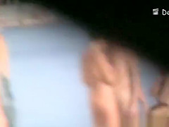 Voyeur at beach films nudists