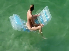 Woman arrives to the beach and undresses