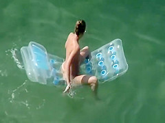 Woman arrives to the beach and undresses