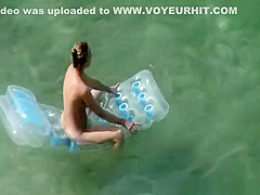 Woman arrives to the beach and undresses