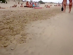 Nudist voyeur walking on the nudist beach