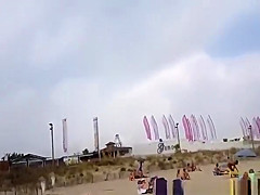 Nudist voyeur walking on the nudist beach