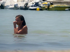 Young puffy nipples on the beach