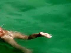 Horny couple in the water on an air mattress