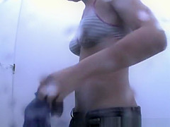 Girl in tiger pattern bikini changes it