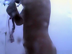 Girl in tiger pattern bikini changes it