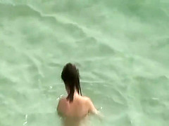 Water humping lead to a fuck on a beach
