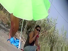 Nudist women spied in the beach sunbathing