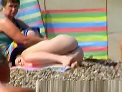 VoyeurCAM Sexy Brunette sunbathing nude