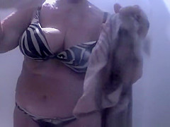 Chubby granny spied in the beach cabin