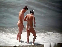 Injured nudist resting by the sea