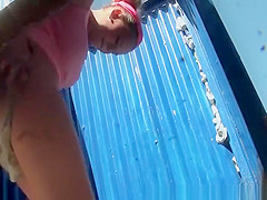 Big boobs woman in beach cabin changing
