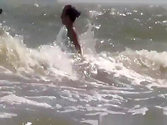 Topless and nude friend at beach