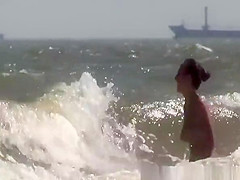 Topless and nude friend at beach