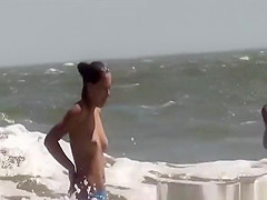 Topless and nude friend at beach