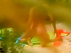 Horny girl masturbating on a beach