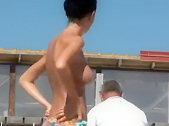 Petite girl with big topless boobs
