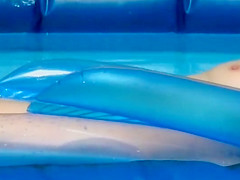 Naked girl creeped in an inflatable pool