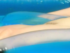 Naked girl creeped in an inflatable pool