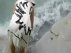 Skinny nudist in beach