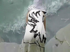 Skinny nudist in beach