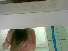 Saggy tits of a babe in the pool cabin