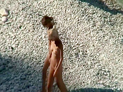 Nudist friends on the beach