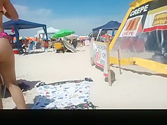 Hot asses in small bikinis in the beach