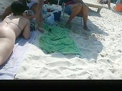 Hot asses in small bikinis in the beach