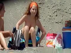 Nudist woman with round firm tits